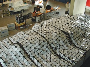 Members of the deCOi Architects team test HypoSurface in preparation for an installation.