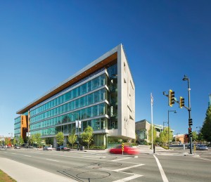 The building's north facade looks toward a planned high-rise residential district.