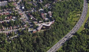 The building's sinuous form cradles the central chapel and hugs the edge of the Don Valley ravine, affording expansive views to the Sisters who live within it.