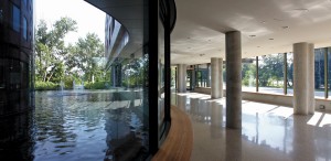 Opposite the main entrance, a reflecting pool surrounds the jewel-like chapel.