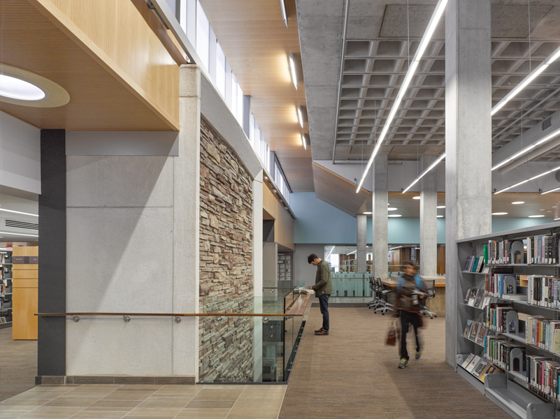Bridges weave through the former exterior bays of the library.
