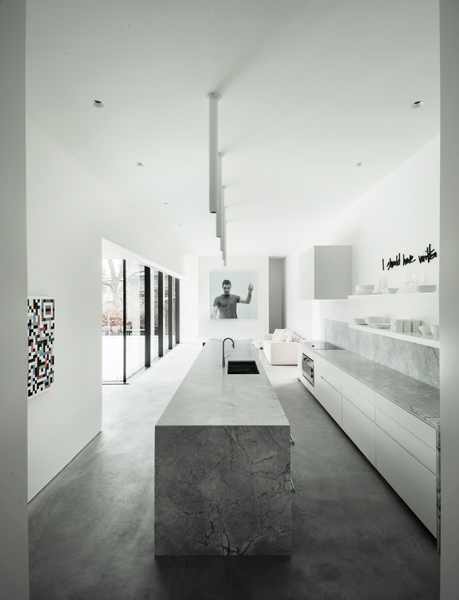 The generous kitchen replaces a formerly cramped service area.