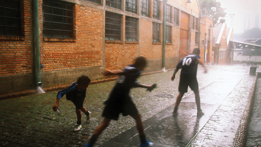 Another still from Tapio Snellman's film SESC Pompeia depicting urban life in and around Bo Bardi's monumental building.