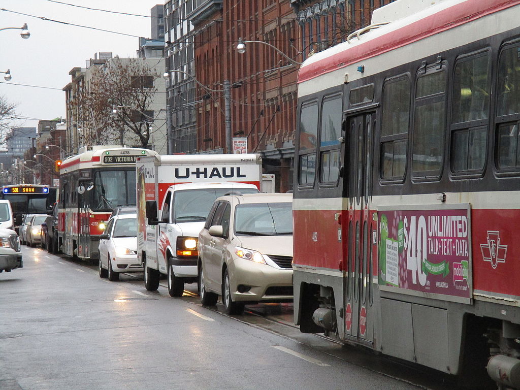 With real estate prices rising sharply across major urban centres, moving becomes a more attractive proposition for many Canadians, albeit an expensive one. Photo by booledozer via Flickr Commons.