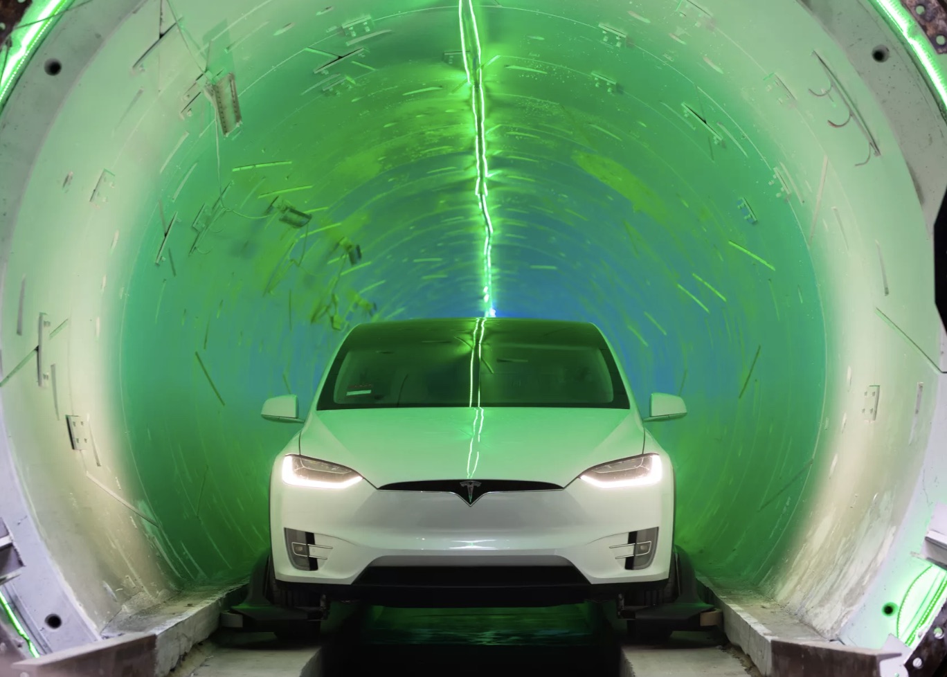 Elon Musk unveils underground tunnel, offers rides to VIPs