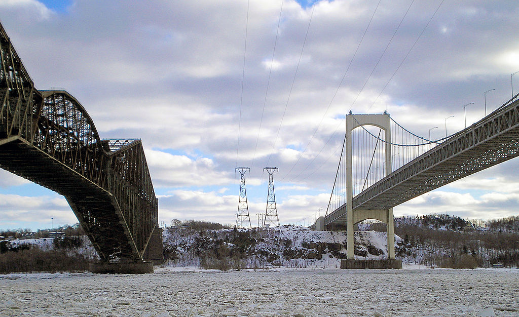 Should the Quebec and Pierre-Laporte Bridges be joined by a "third link" in the near future? Photo by Blanchardb via Wikimedia Commons.