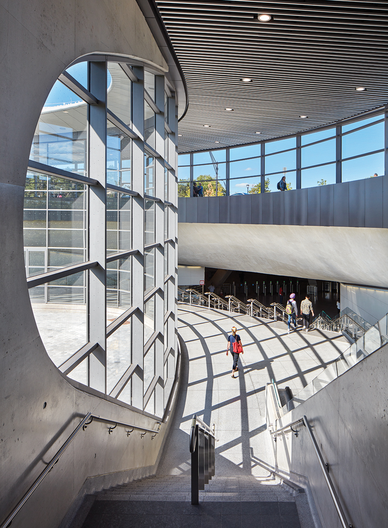 Curvilinear concrete supports contribute to an open, airy atmosphere.