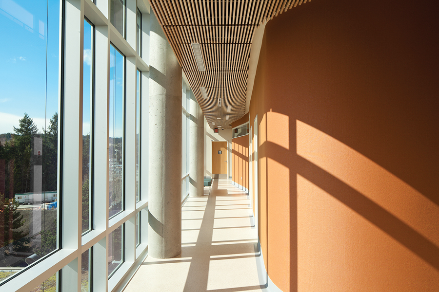 Corridors are flooded with natural light.