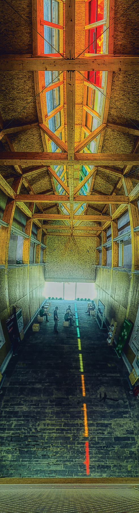 A barn-like commercial space by Chinese architect Yehao Song uses colourful skylights for a playful touch. (Yehao Song)