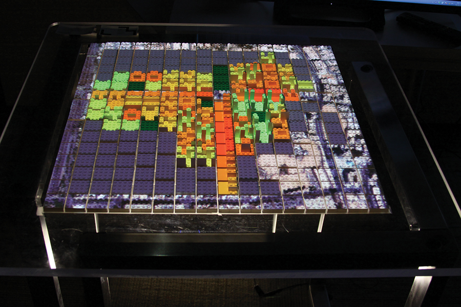 Two views of an interactive city modeling system, developed by the MIT Sustainable Design Lab, that gives realtime feedback about daylight penetration. (Cody McCullough Rose)