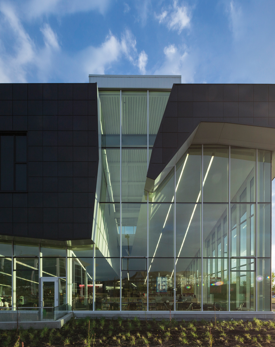 An animated building section connects the upper level seniors’ centre to the library below, bringing glowing clerestory light into both spaces.
