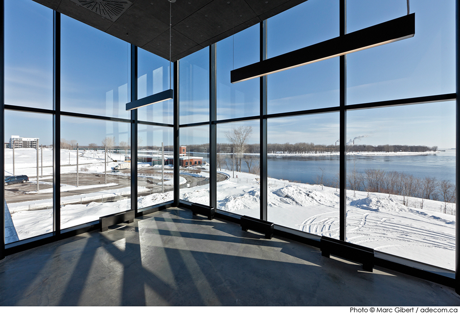 A staff room on the upper level looks out towards the St. Lawrence River.