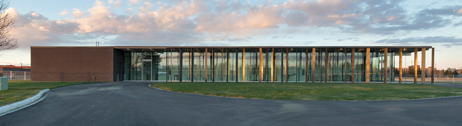 The minimalist Mill Woods Sport Park Pavilion is a strongly horizontal presence within a group of ball fields in south Edmonton. Photo: Jim Dobie