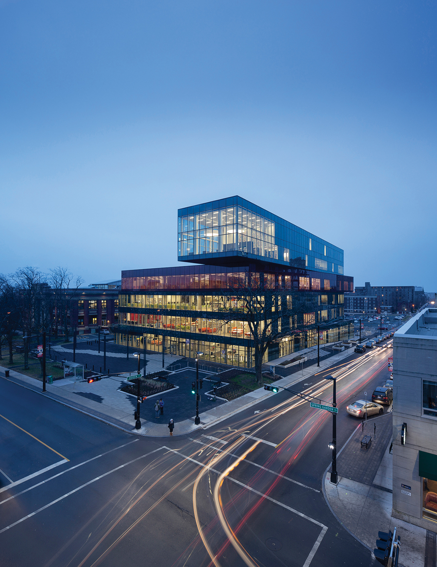 The library is composed of stacked boxes that recall a pile of books.