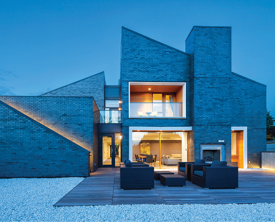 Apartments are grouped in four house-like forms, each of which enjoys shared indoor and outdoor living rooms. Photo by Ed White.