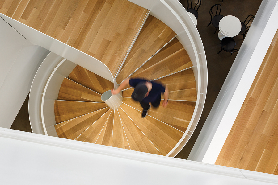 Sculptural staircases join the three main levels.