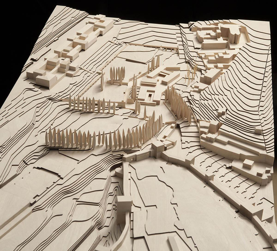 “Site Model with Landscape Integration” Álvaro Siza, 2011. Collection of the Patronato of the Alhambra and Generalife. From the curator: Álvaro Siza enjoys paraphrasing Michelangelo by saying that the model is the most well spent money of any project. Having collaborated with the architect for years, expert model-maker Alvaro Negrello seems to agree, as he delivered perhaps the most important architectural mock-up of the exhibition. It makes a very clear case for the project’s intentions, with no room for misconceptions, presenting a discrete platform anchored by the topography outside of the monument’s wall. Gardens reclaim the existing parking lot, offering a new square to the city where vegetation and water lines soften Granada’s dry climate. Complex height systematizations reconnect the new museums with the street and allow for 8,500 daily visitors to comfortably cross the site, like one would in a miniature prototype of the full-scale Alhambra.