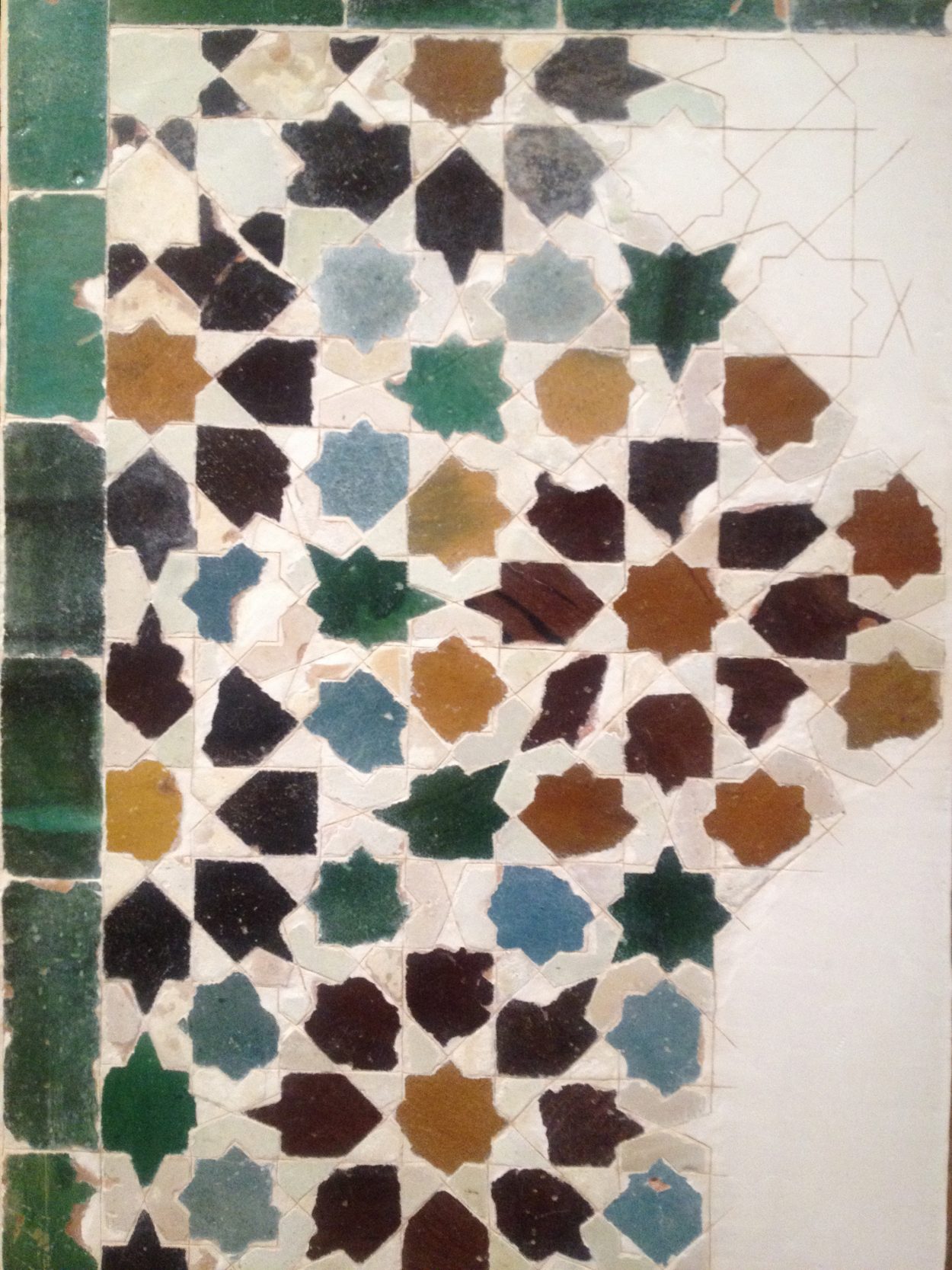 A 14th century mosaic fragment from the Alhambra.