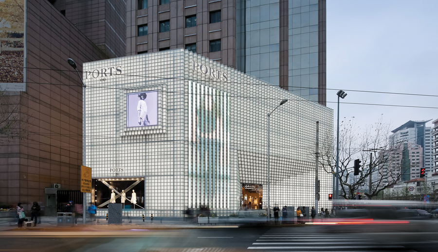 Satin glass blocks embedded with LEDs are arrayed in a 3-D composition to create an icy façade for the Ports 1961 flagship store in Shanghai. Photo by Shengliang Shu
