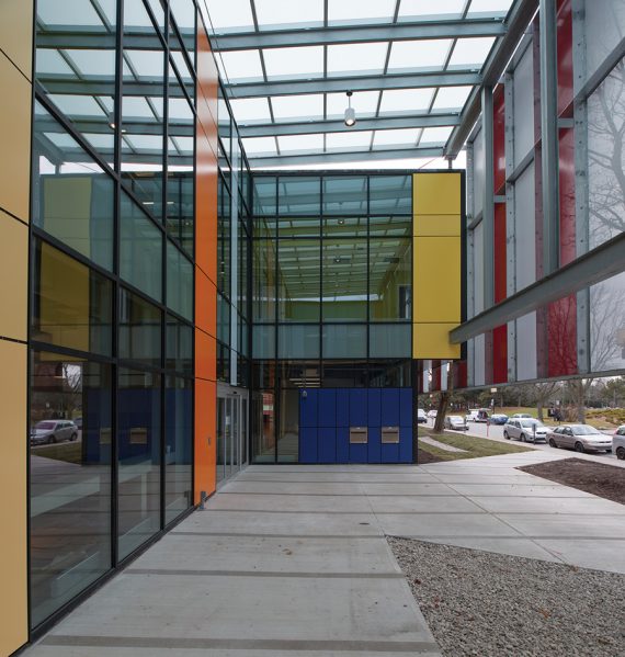 A covered courtyard creates a sheltered gathering place at the main entrance. Photo: ALAIN LAFOREST