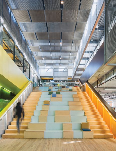 A grand staircase acts as a gathering spot for library patrons to read, meet and chat. Conceptually, the stair is the inverse of the formal theatre, putting ordinary people in the centre of the action at the heart of the building.