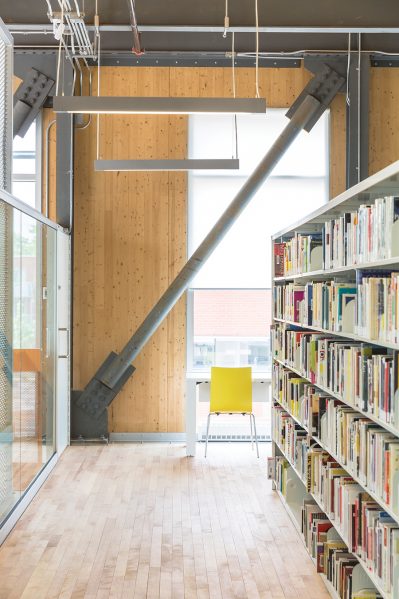 Exposed steel cross-bracing and CLT walls allude to both industrial spaces and barns.