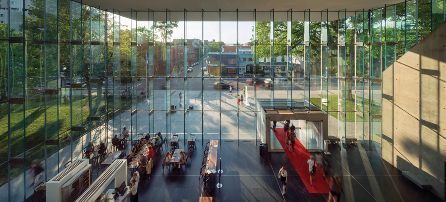 The Grand Hall is detailed as an extension of the outdoor plaza. Photo by Nic Lehoux