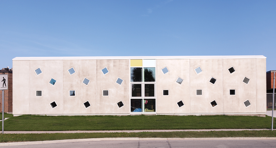 Insulated concrete panels were also used for BridgmanCollaborative’s Mothering Project, an addition that bridges between an existing clinic and nursery.