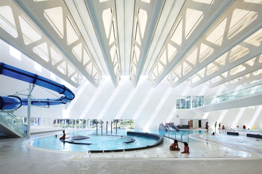 A calm white interior unites the array of pools inside the Guildford Aquatic Centre, one of several new recreation facilities in British Columbia’s fastest growing city. Photo: Ema Peter