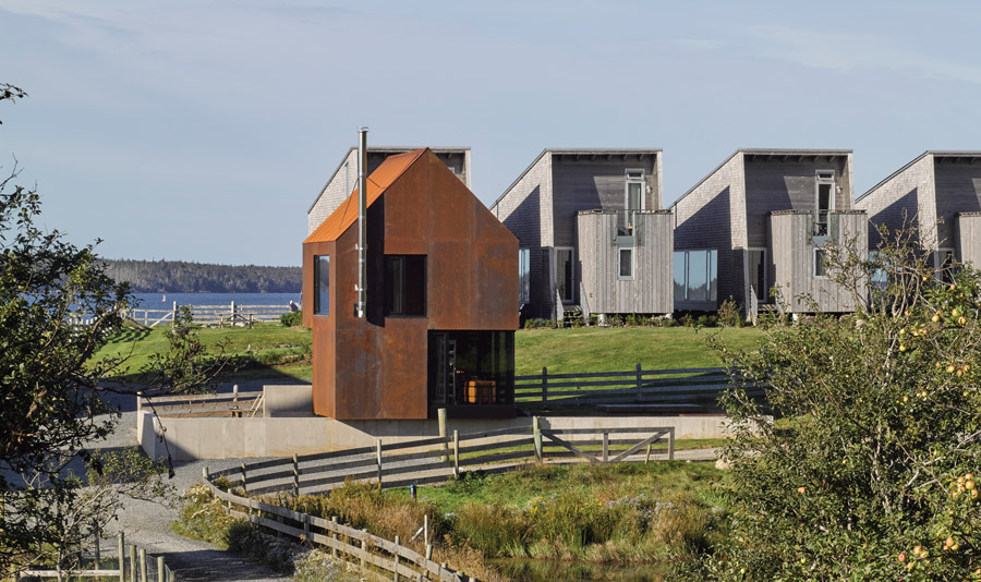 Concrete foundation walls extend outwards to define the surrounding areas.