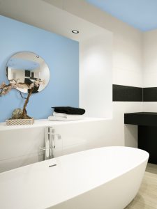Soothing blue, such as Teton Sky by Dulux Paints, shown on the wall and ceiling, creates a relaxing, spa-like feel in a bathroom when combined with off-white, light grey or tan.