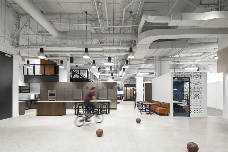 Inhabiting and excavating a portion of the Philip Johnson-designed CBC building in downtown Toronto for their clients Bensimon Byrne, OneMethod and Narrative PR gave Lebel & Bouliane and Mazen Studio the chance to play with warehouse-like dimensions and build large-scale interior elements, such as bleachers, mezzanines and even a basketball court.