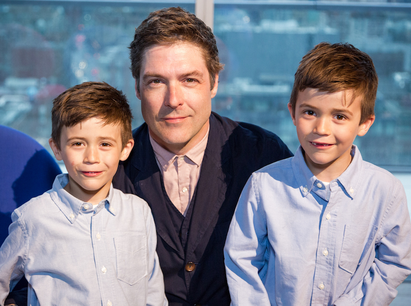 Klaus Nienkamper Jr., president of the Klaus by Nienkamper retail store on King Street East, with his six-year-old twins, Otto and Oliver.