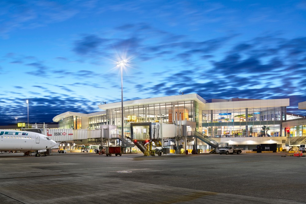 Vancouver International Airport A-B Connector - Wall 4000K LED luminaires at 26W provided lighting at doors and 47W for roadway around the building. Extensive exterior glazing allows for significant daylight penetration. Photo credit: Ed White Photography