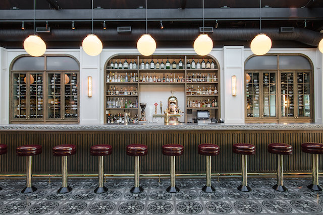 Located along the busy 17th Avenue corridor and evoking a Parisian brasserie aesthetic, Royale employs leather and velvet for the banquettes, and marble table tops and polished brass accents for the 50-ft. long cast zinc bar.