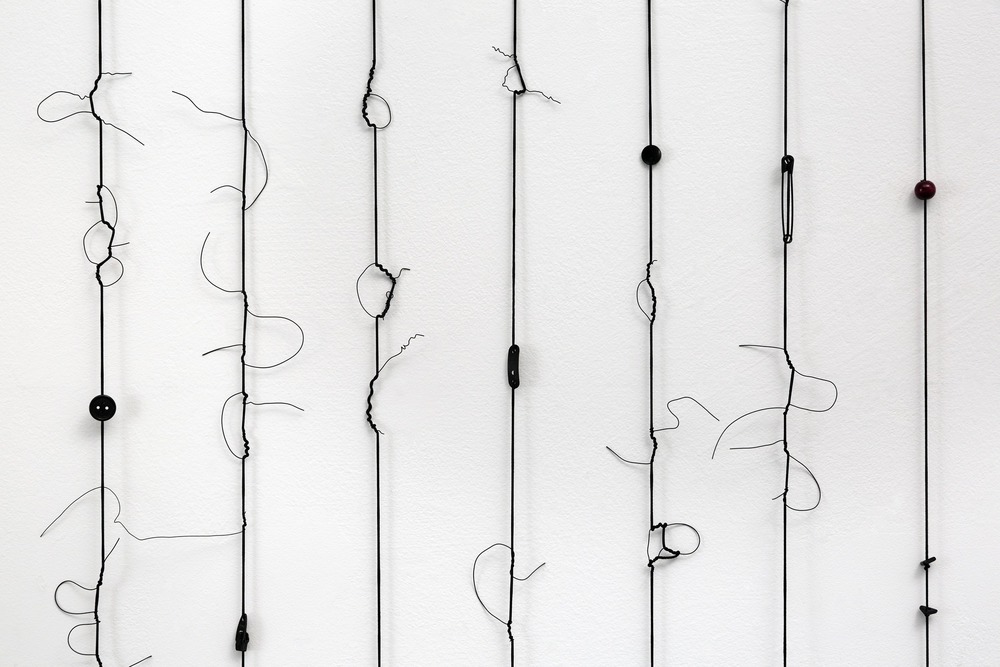 Timelines by Lois Schklar - Timeline 4 detail ( elastic cord, objects). Photo by Peter Lergis.