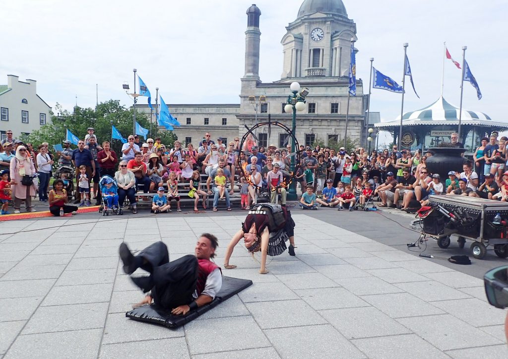 Buskers performing in a square in Quebec City