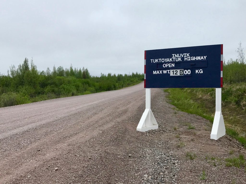 Inuvik-Tuktoyaktuk highway sign advising vehicle weights