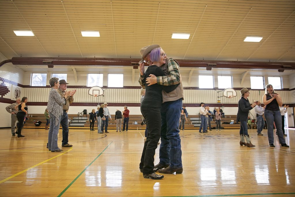 A couple embraces at a Cajun Dance workshop in Elko, Nevada