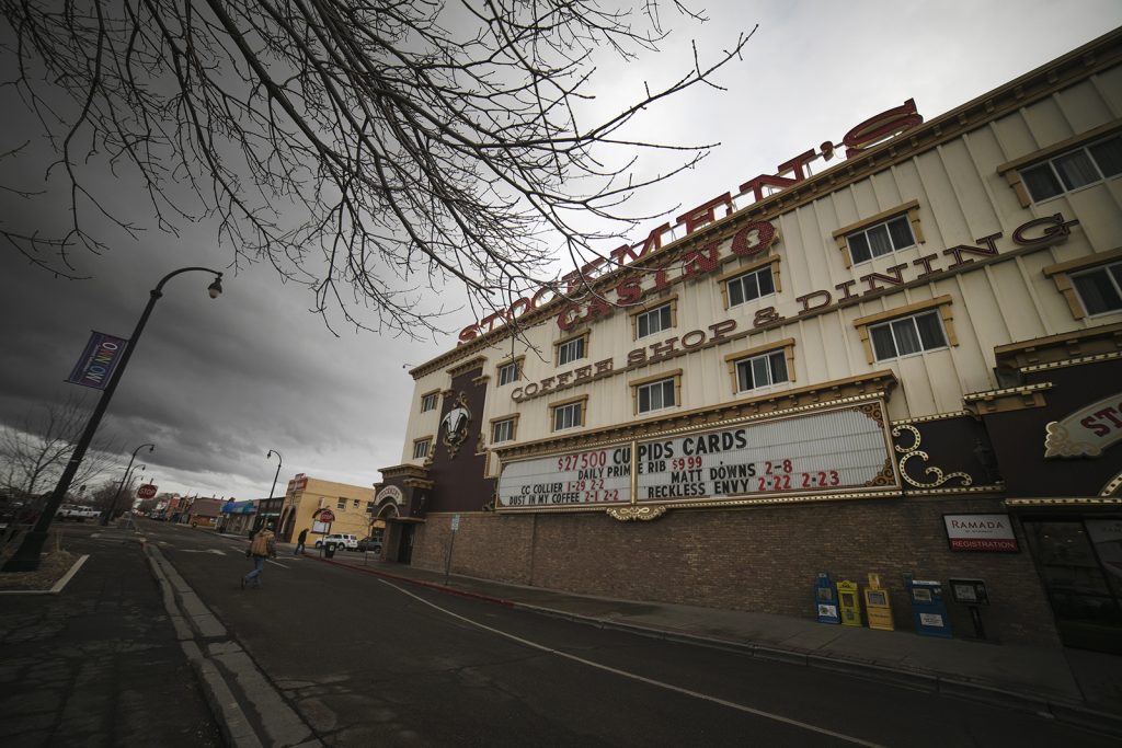 A wide-angle image of an empty street and a building called Stockmen's Casino