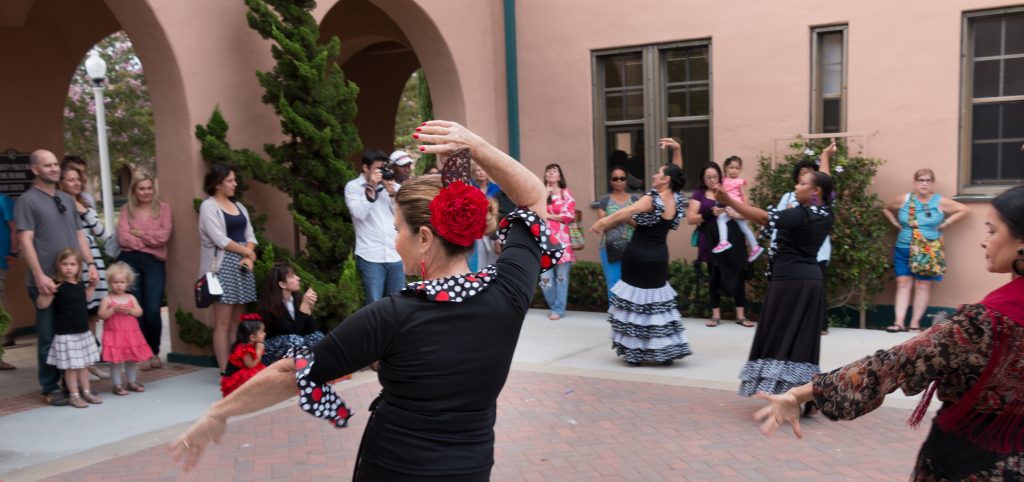 Flamenco dancers in a courtyard