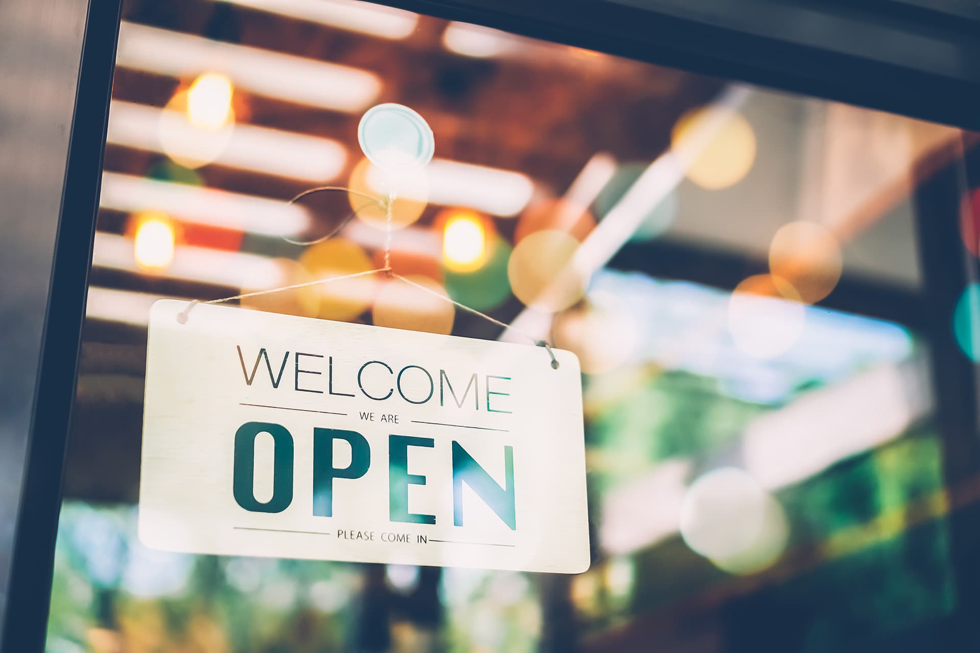 Open sign for businesses with commercial business insurance