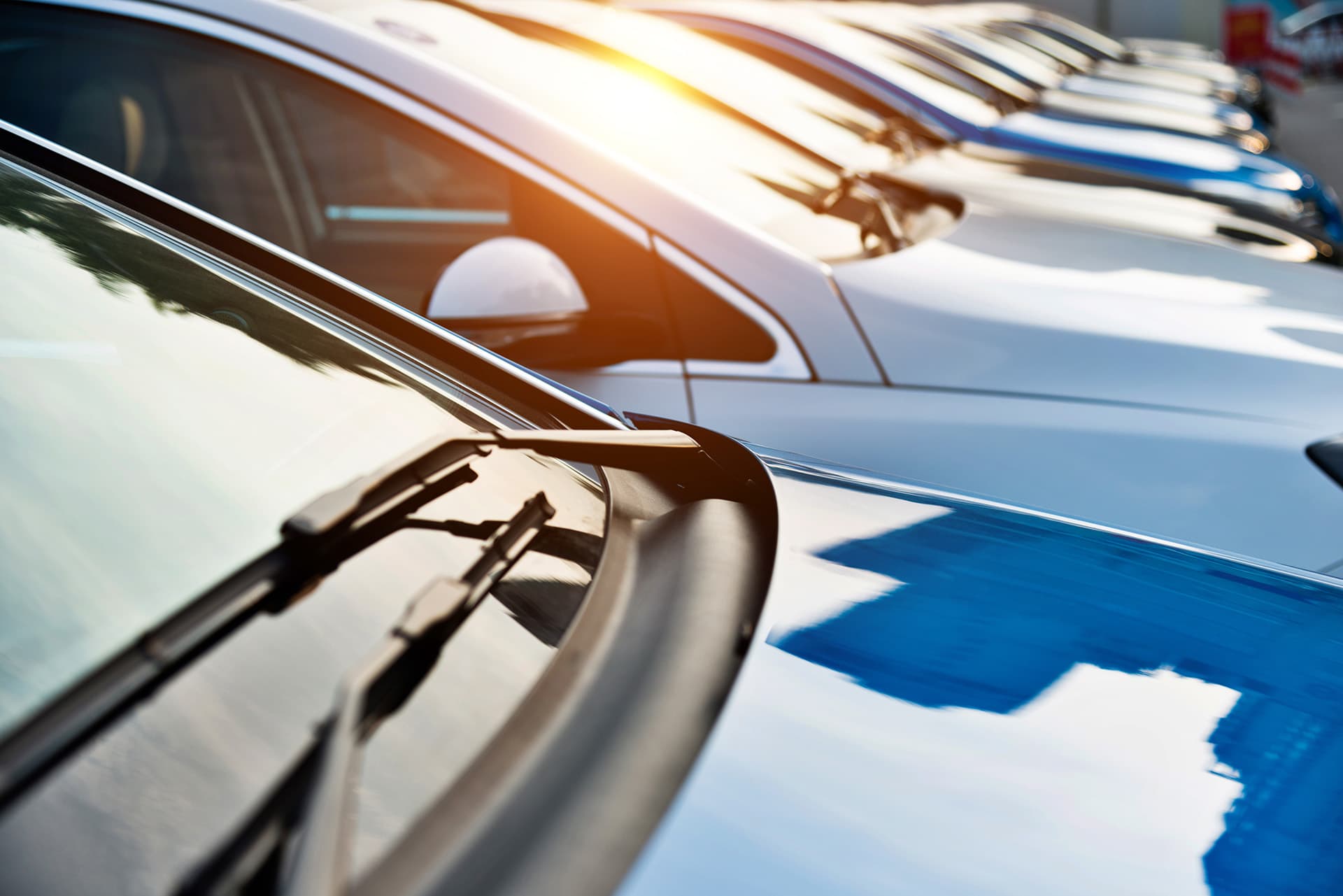 Cars lined up in a row with individually rated auto insurance