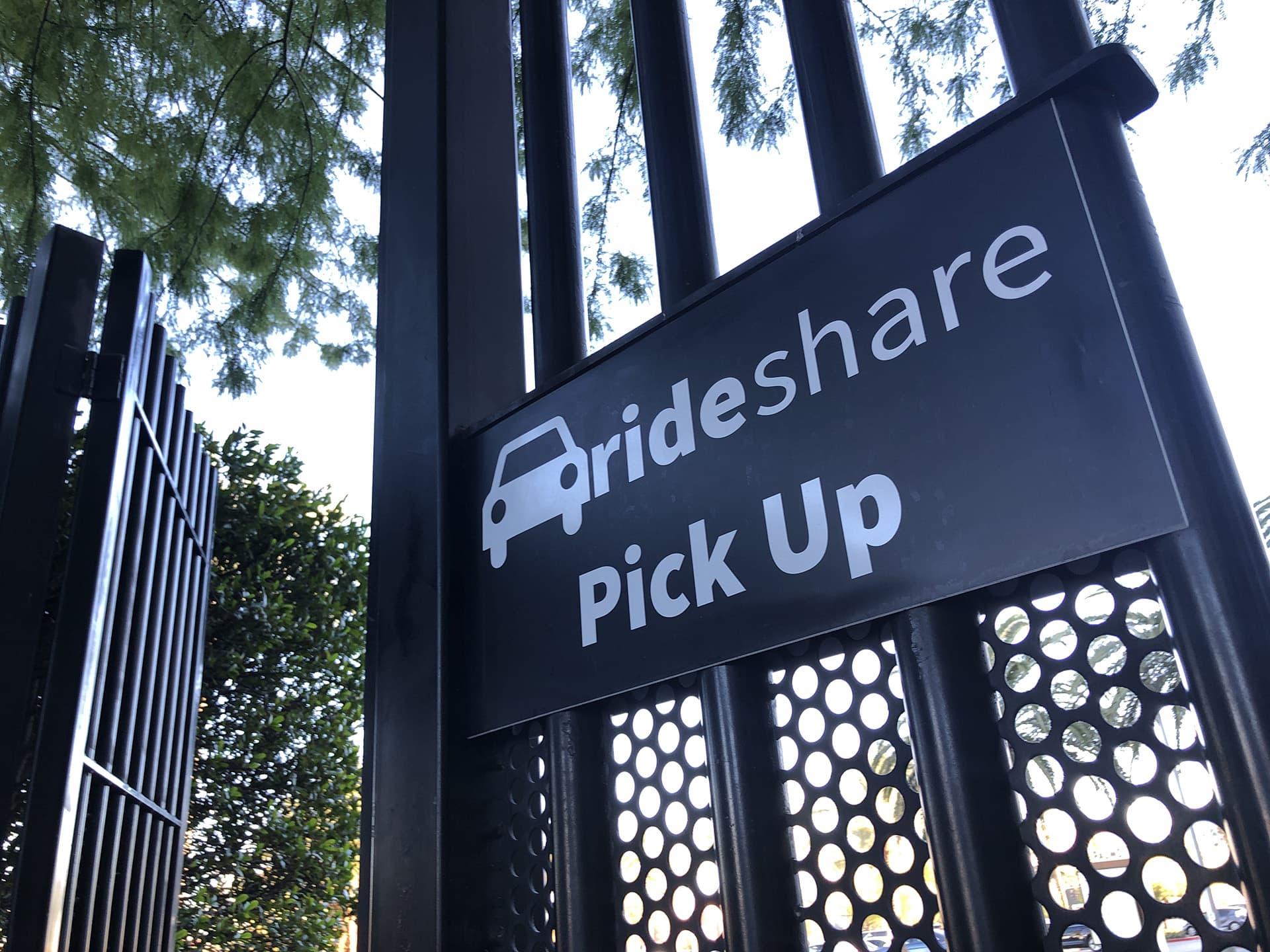 Ride share pick up sign for cars with ride-sharing insurance