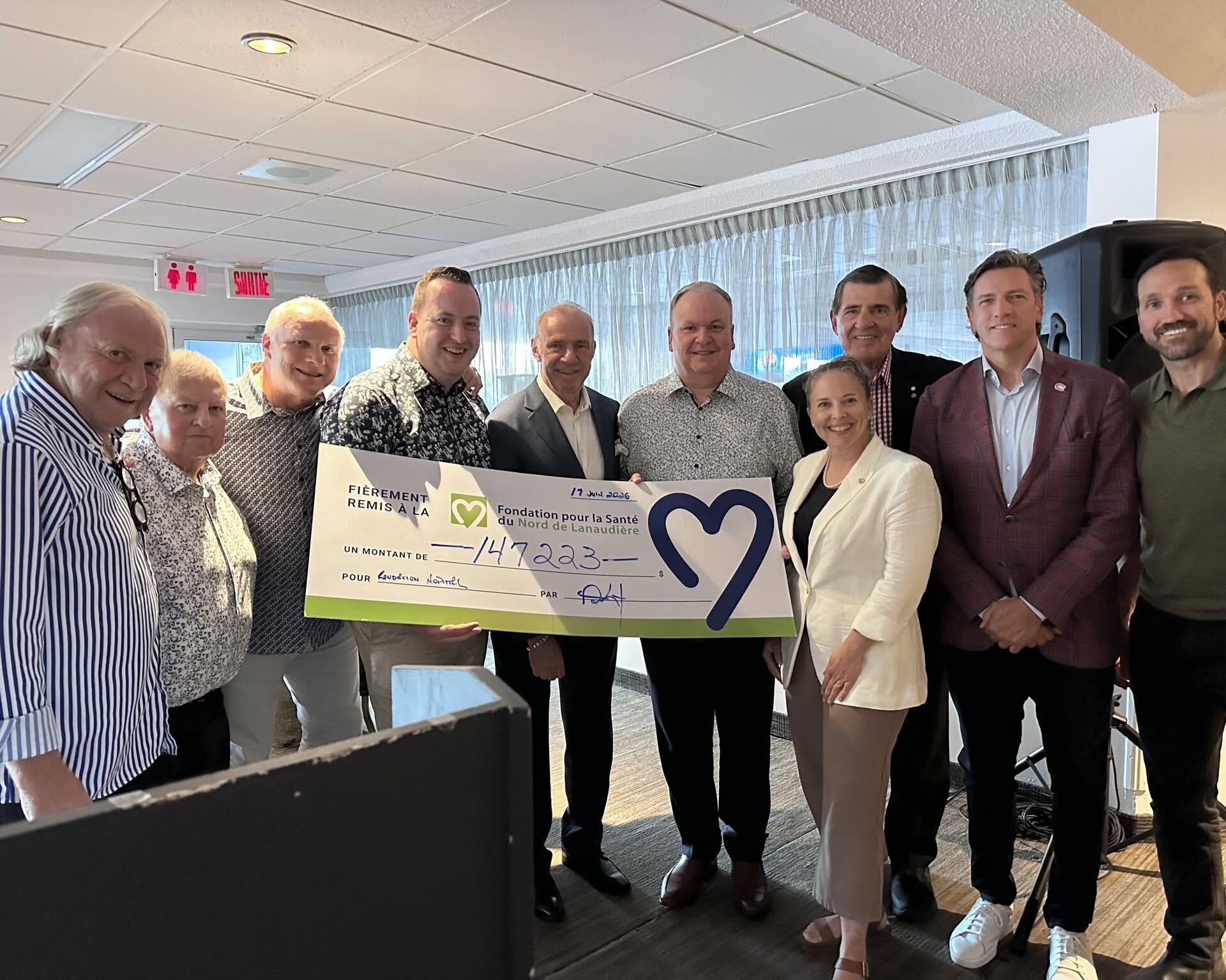 Michel Beaudry, Jean-Pierre Lasalle, Lucien Deblois, Alexandre Chalut, Michel Therrien, Alain Chalut, Maude Malo, Serge Savard, Patrice Brisebois, Mathieu Dandenault. (Photo gracieuseté)