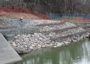 Stone on bank of watercourse