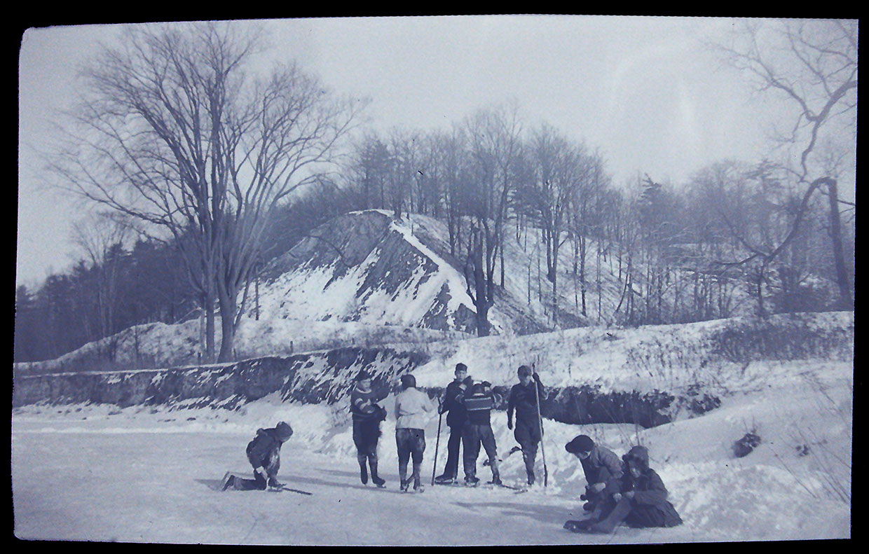 archival photo of boys playing hockey at the Forks of the Don
