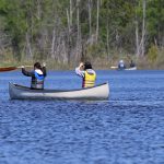 paddlers on lake