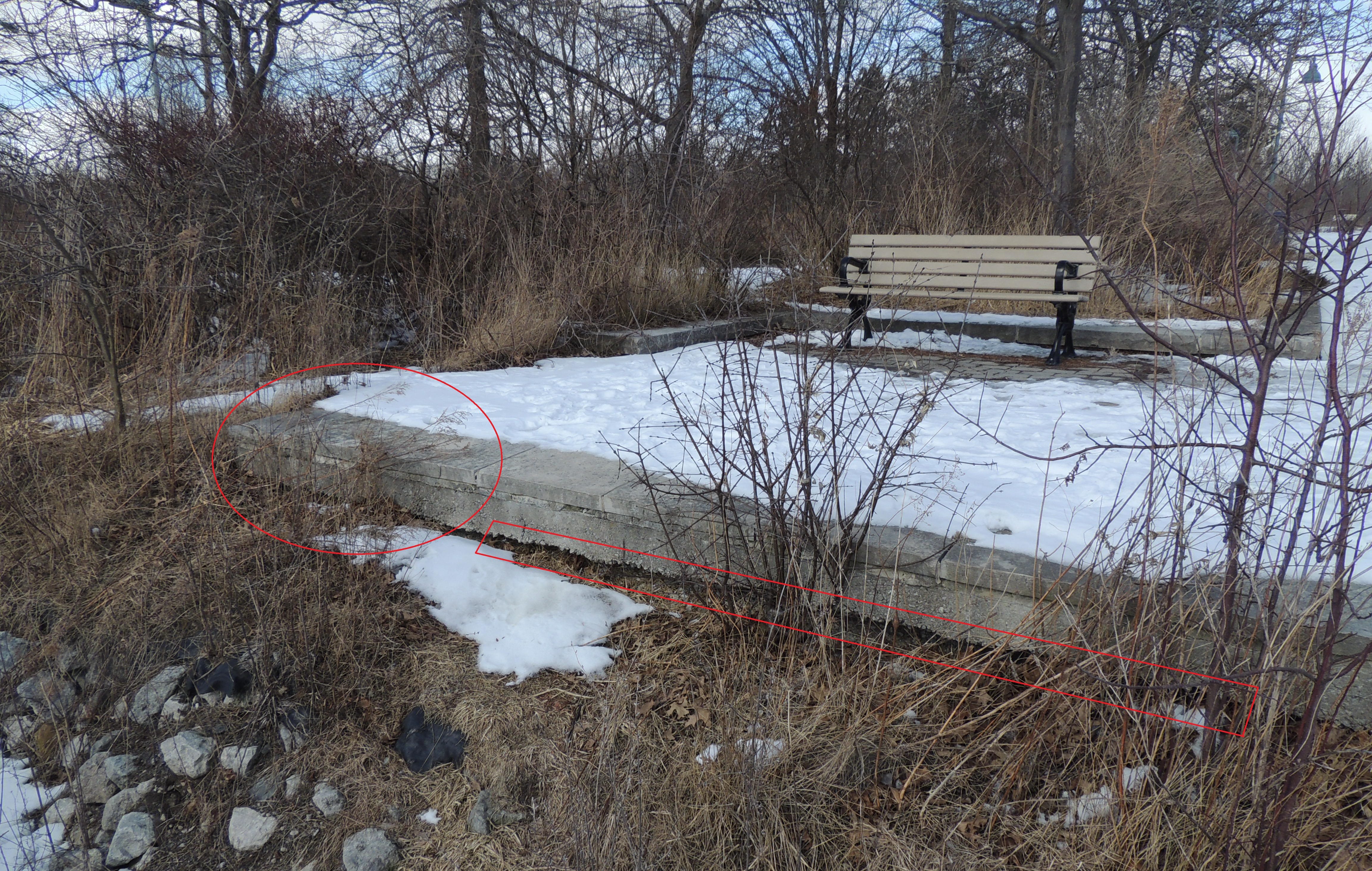Undermined interlocking brick platform adjacent to the armourstone seawall. Source: TRCA, 2019.