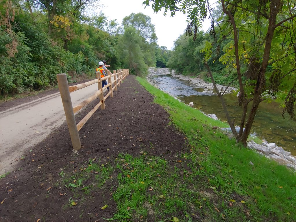 Terraseeded buttress with post-and-paddle fencing at upstream end of site